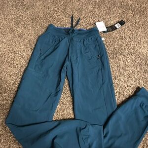 Infinity mens XS scrubs . New with tag. Athletic fit. Caps. Cherokee uniform.